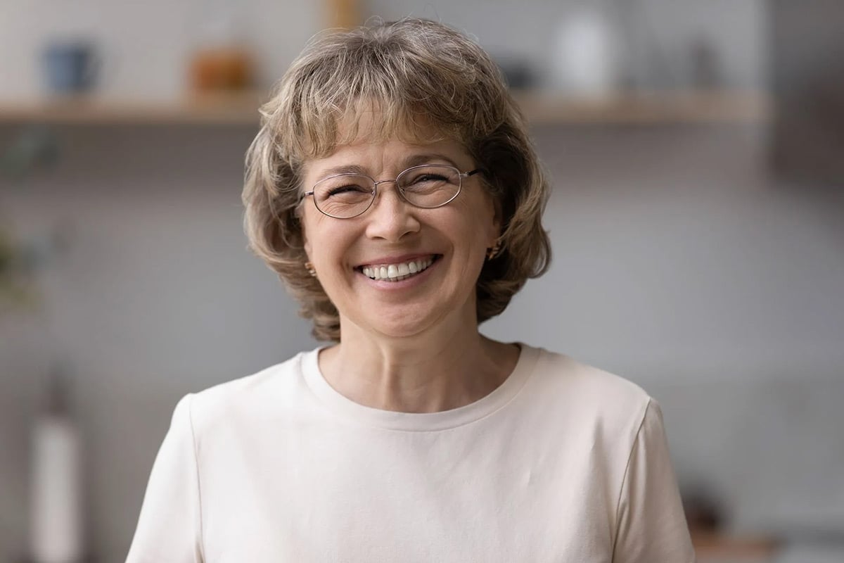 Patient smiling during a dental visit